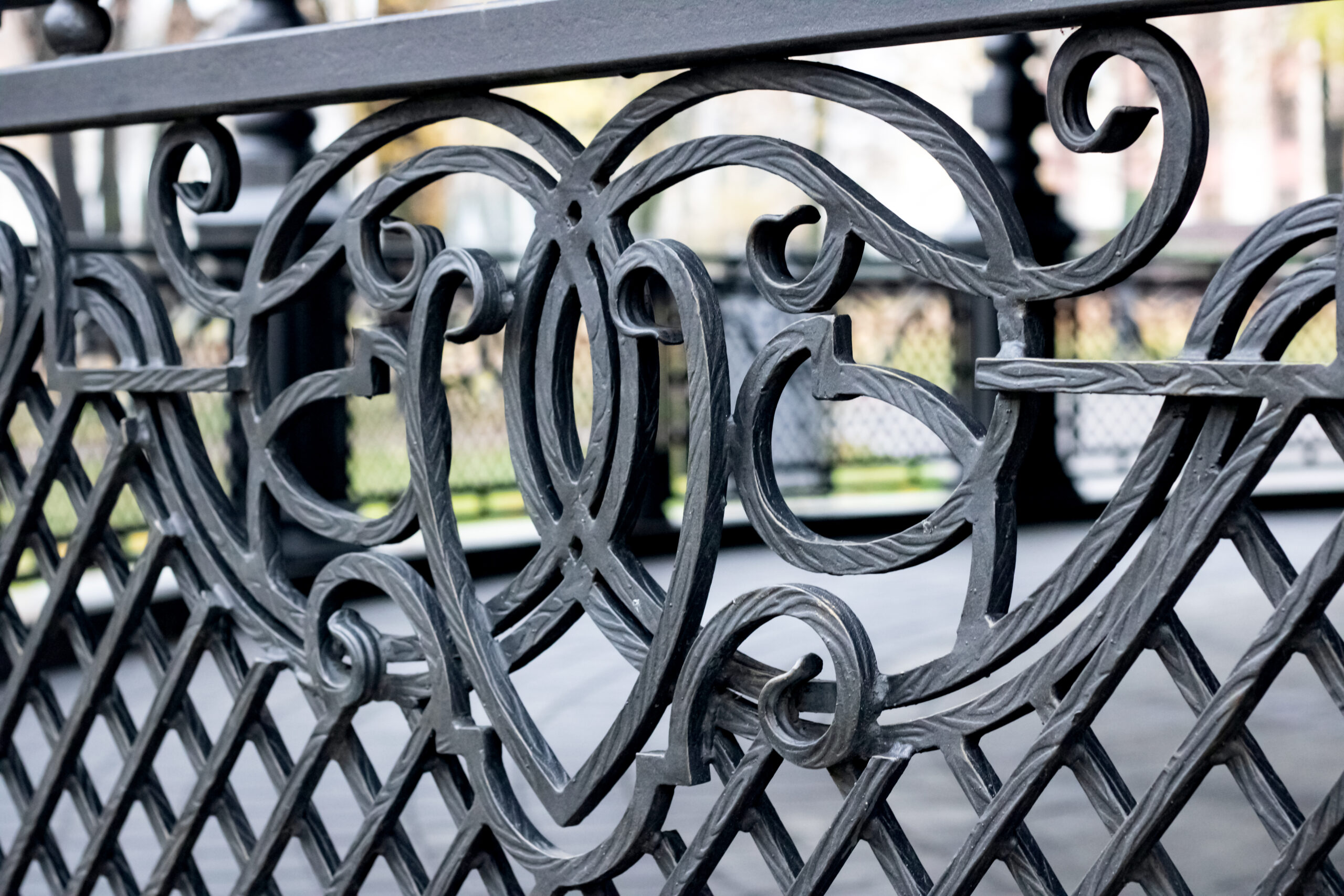 Forged patterns on the fence, decoration for the garden